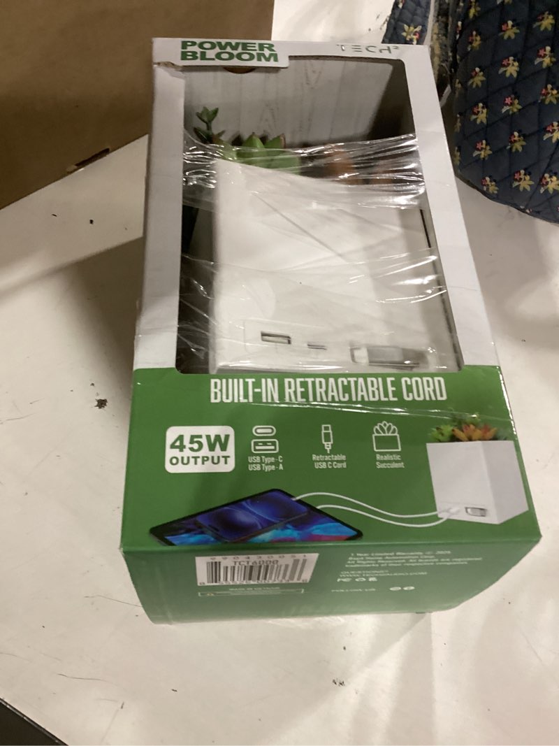 Condition photo showing Good Condition for decorative charge station for celphone power bloom with built-in retractable usb-c cable, usb-a and usb-c ports