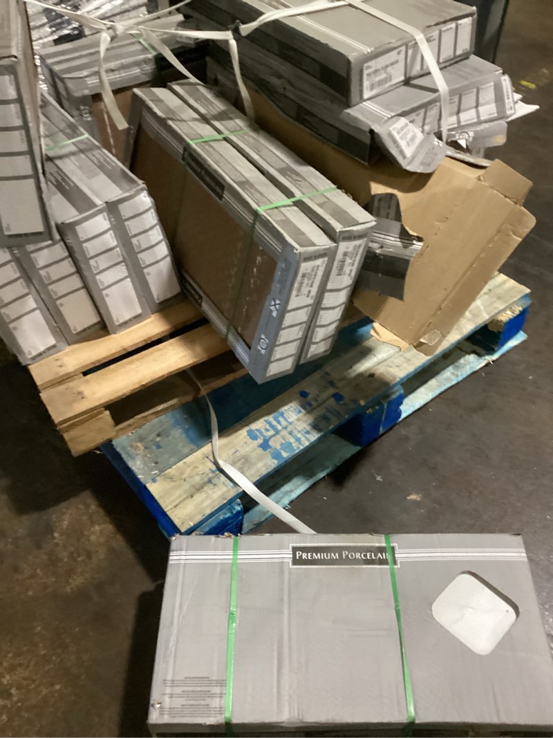 Condition photo showing As Is for premium porcelain pure white 12x24 polished set pallet lot (possibly 11)
