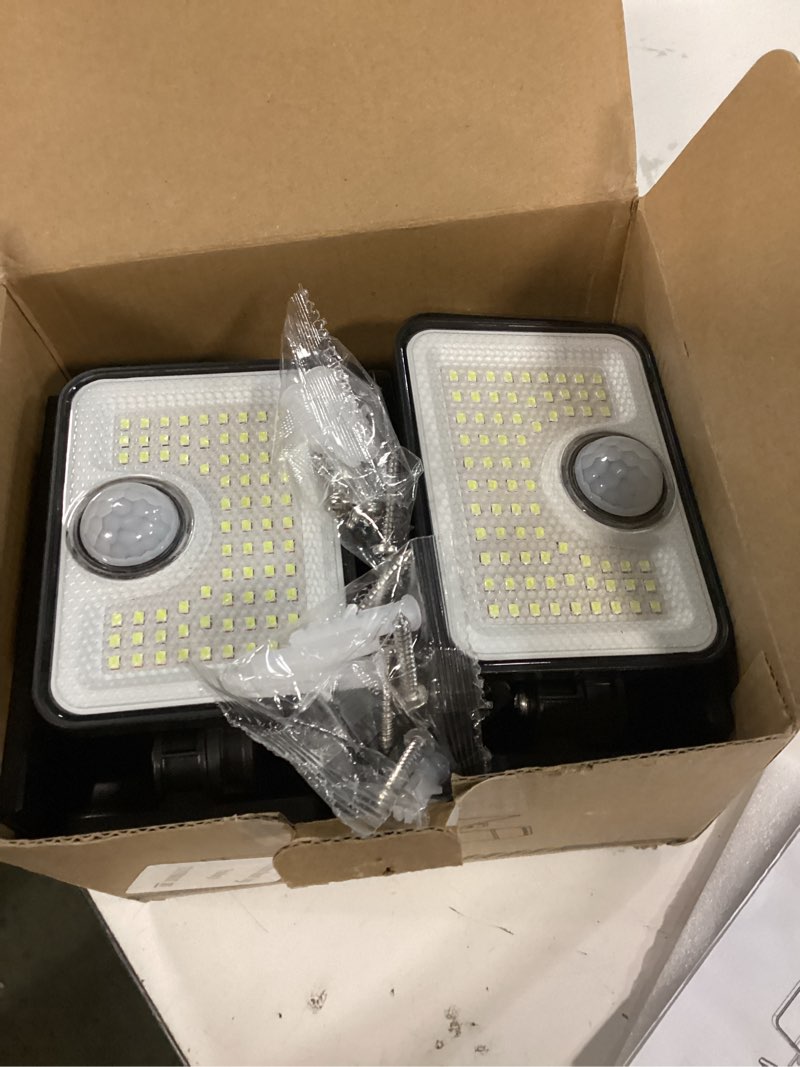 Condition photo showing Good Condition for 3000lm solar lights outdoor, 4 adjustable heads motion sensor security light, 3 modes, 6500k, ip65 waterproof solar wall flood lights for garden, outside, backyard, 2 pack