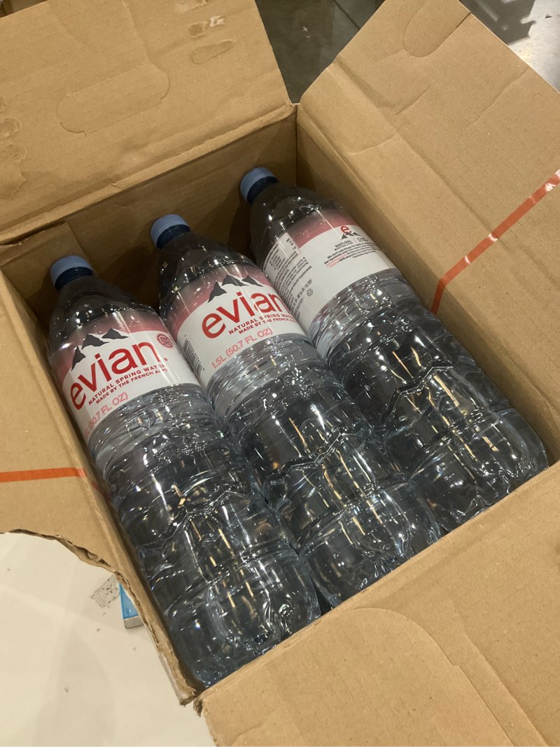 Condition photo showing New/Like New for Evian Natural Spring Water, 1.5 L bottle (Pack of 12) 50.7 Fl Oz (Pack of 12)