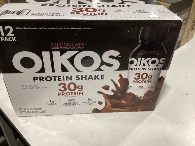 Condition photo showing New/Like New for Oikos Protein Shake, Chocolate, 30g High Protein Drinks, Shelf Stable, Ready to Drink, 5g Prebiotic Fiber, 12 fl oz Bottle, 12 Count?