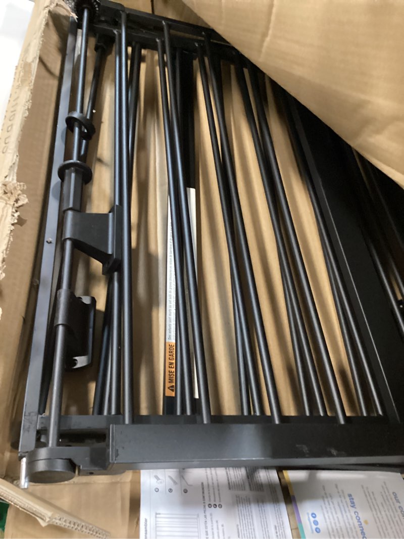 Condition photo showing As Is for Regalo Deluxe Home Accents Widespan Safety Gate, 74.5" W x 28" H, Includes 4 Wall Mounts, Black 74.5" W x 28" H Black