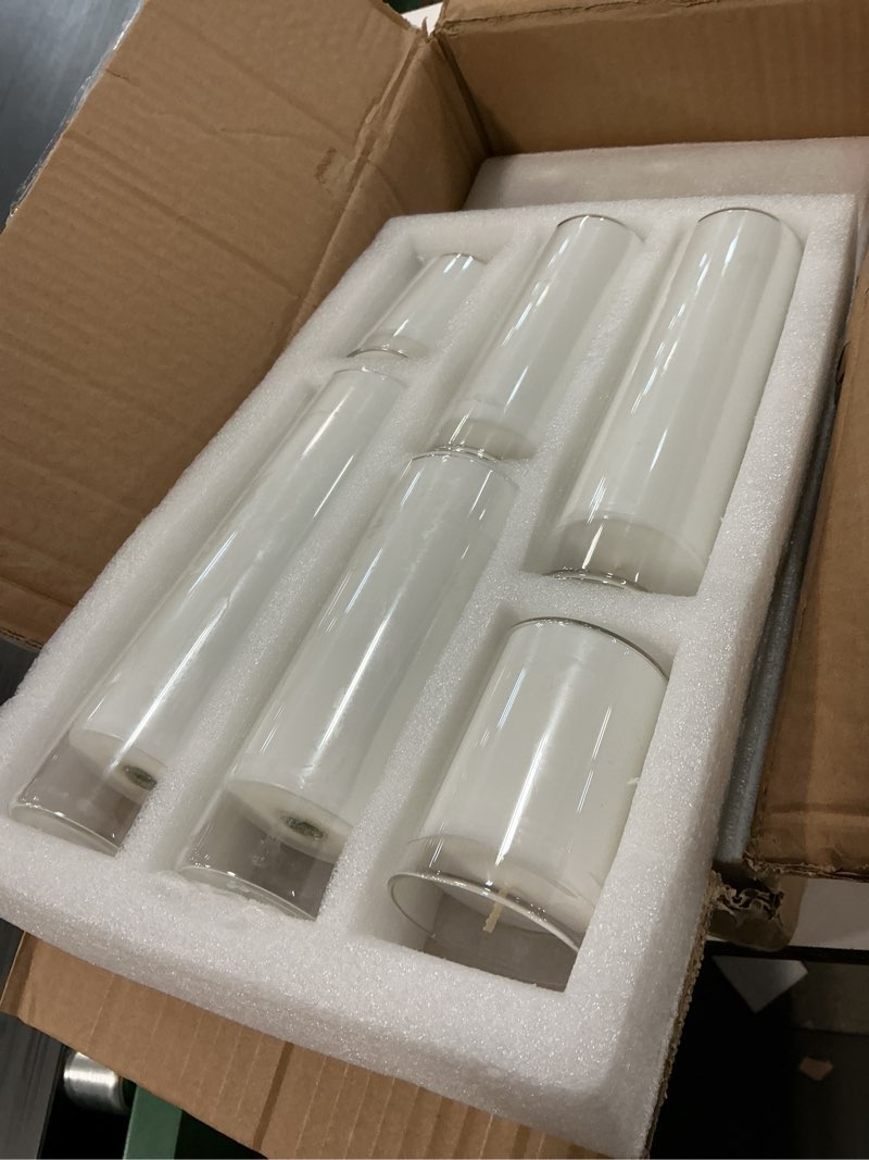 Condition photo showing Good Condition for 18 PCS Pillar White Candles in Glass,Hurricane Candles,Wedding Cylinder Candle,3 Different Lengths 2 x 3/6/8 Inch (6 Each),Creating an Atmosphere Suitable for Various Outdoor Activities. White 18