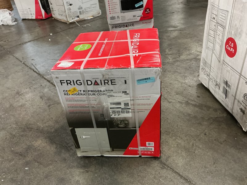 Condition photo showing New/Like New for Frigidaire EFR176 Retro Compact Fridge with Chiller Mini Refrigerator with Built-in Bottle Opener for Office, Bedroom, Dorm Room or Cabin, 1.6 cu ft 16" D x 18" W x 18.5" H, Moonlight