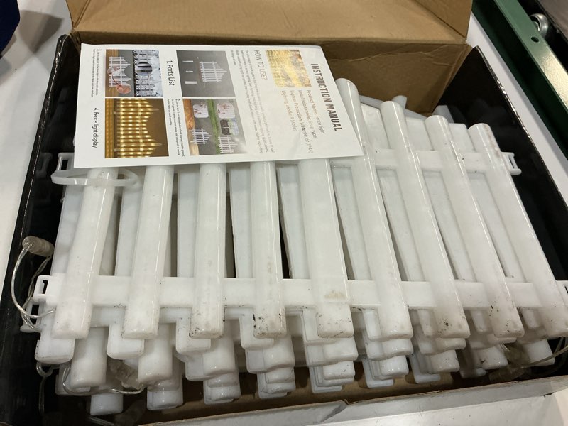 Condition photo showing As Is for hopolon 8 pack warm white lighted garden fence,11.1in(h) x 9.1ft (l)