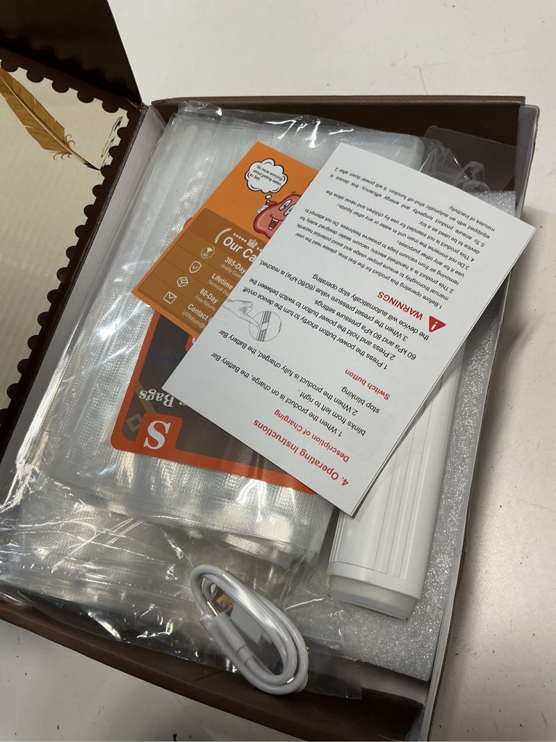 Condition photo showing As Is for compact vacuum sealer for food (contains 30 reusable seal bags) featuring led pressure display, ultimate suction power, handheld vacuum sealer machine, portable food sealer vacuum sealer (with 30 bags)