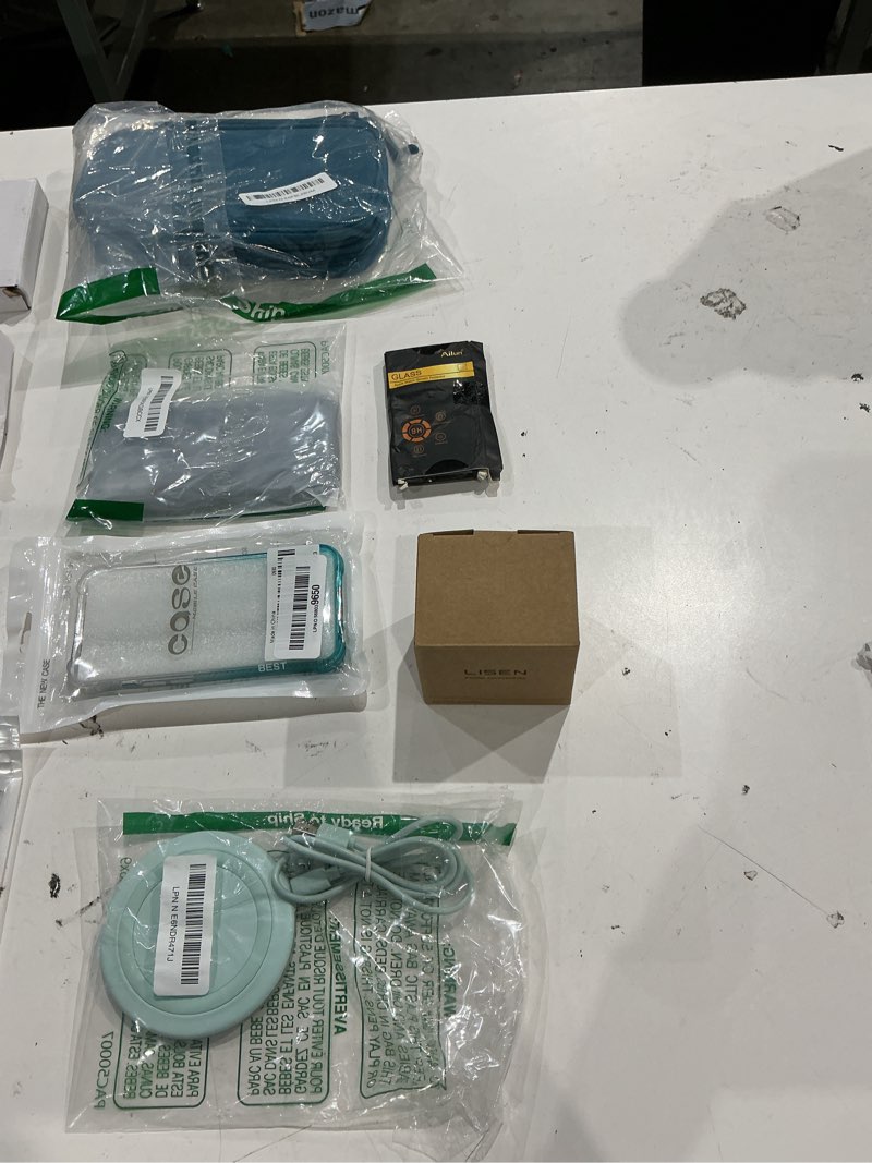 Condition photo showing As Is for assorted lot of electronics (headphones, small gadgets, headsets, etc.) 