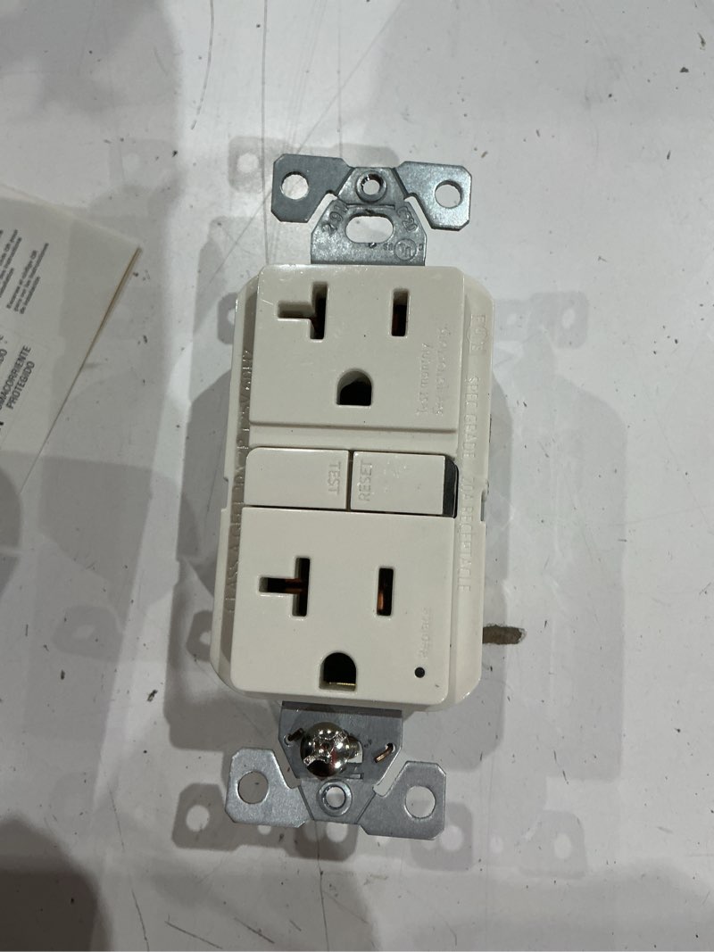 Condition photo showing As Is for eaton 20-amp 125-volt gfci residential decorator outlet, light almond