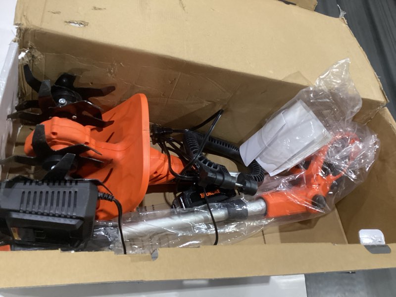 Condition photo showing As Is for ukoke cordless tiller cultivator 20v 2.5 a battery 280 max rpm powered tiller cultivator, w/24 steel blade cultivate max tilling 5'' deep path by 7.8'' wide, orange, st1902, not tested