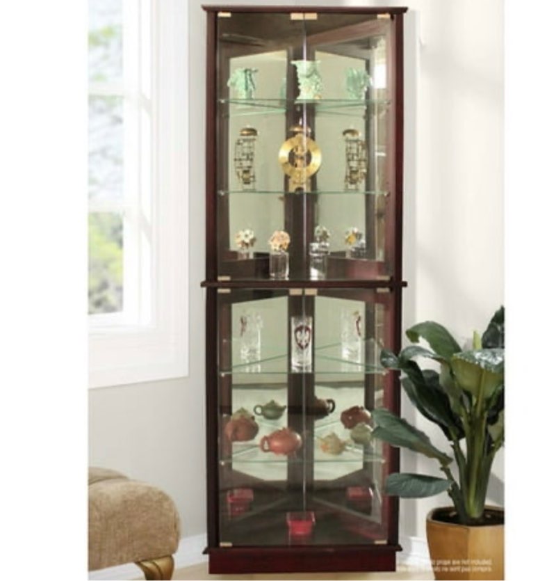 Charlton Home Lohmer Corner Curio Cabinet "CHLH1467FeaturesMirrored back panelAdjustable levelersSturdy constructionShelving weight capacity: 17 lbsFloor standingDoor closes tightly: YesProduct Type: Curio cabinetDesign: CornerStyle (Old): TraditionalFinish: CherryMaterial: WoodHardware Material: IronHardware Finish: Metal DimensionsMirrored side: 17.5"" WSide corner depth: 17.5Overall Height - Top to Bottom: 72""Overall Width - Side to Side: 26""Overall Depth - Front to Back: 13""Overall Product Weight: 77.6 lbs SpecificationsCommercial ONLY Cert...