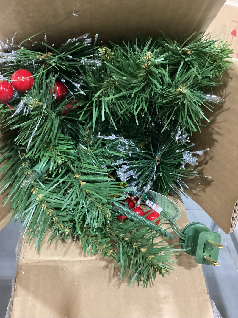 Condition photo showing Good Condition for national tree company 9 ft pre-lit crestwood spruce artificial christmas garland, christmas decoration with glitter, pinecones, red berries, 50 clear lights, 180 tips, green plug in tree