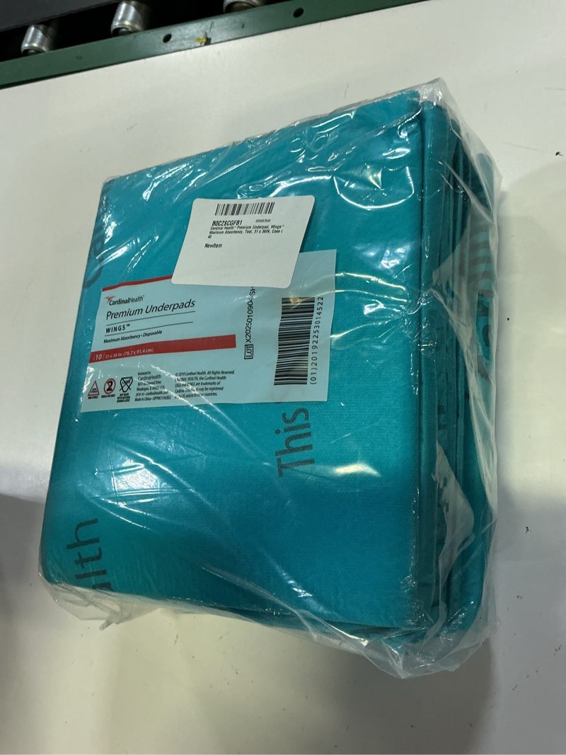 Condition photo showing New/Like New for cardinal health™ premium underpad, wings™ maximum absorbency, teal, 31 x 36in, case of 40 31 in x 36 in case of 40