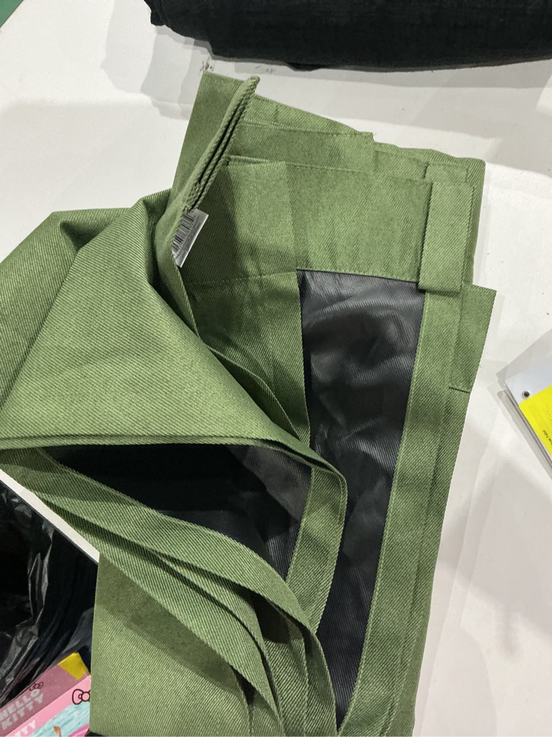 Condition photo showing Good Condition for mainstays green solid blackout rod pocket with back tabs curtain panel pair  set of 2  30  w x 63  l