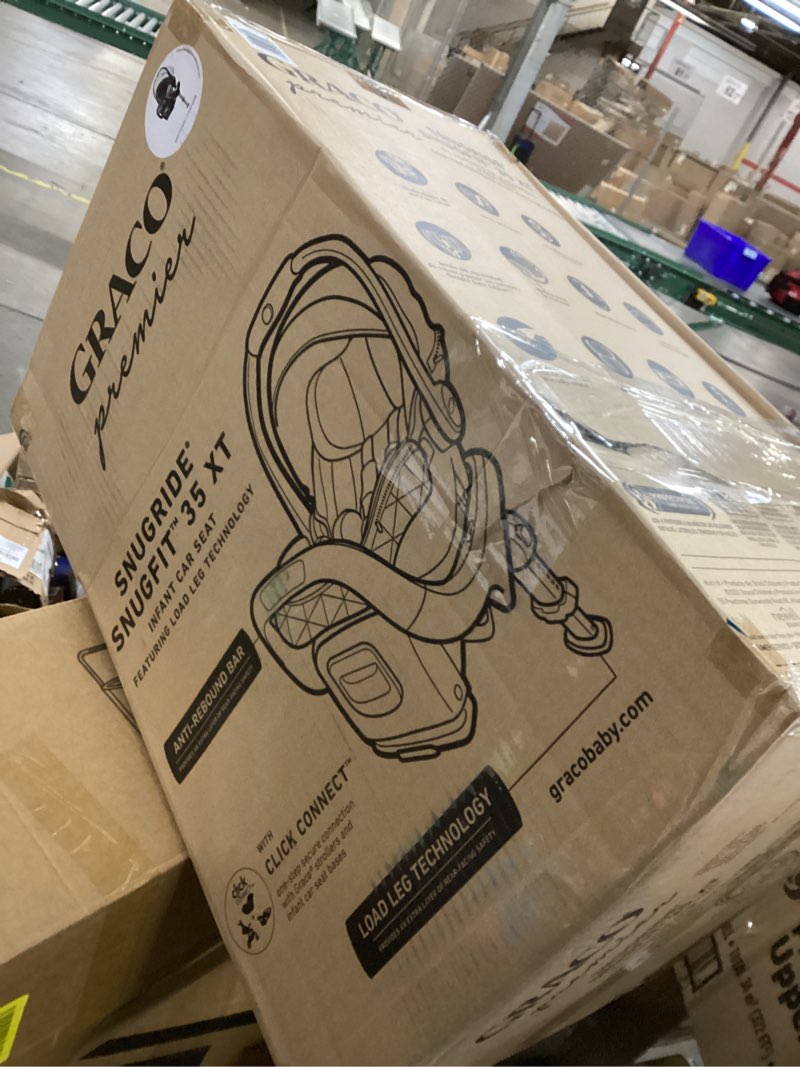 Condition photo showing New/Like New for Graco® Premier SnugRide® SnugFit™ 35 XT ft. Load Leg Technology
