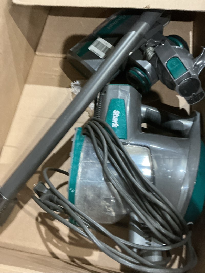 Condition photo showing As Is for shark corded stick vacuum, ultra-lightweight, swivel steering, powerful deep-cleaning, floor-to-ceiling versatility, converts to a handheld vacuum, carpets & hardfloor, green, cs110em