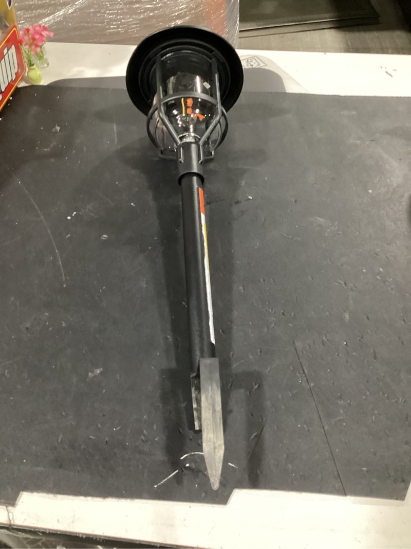 Condition photo showing As Is for harbor breeze path light 15 -lumens 0.2 -watt black solar led outdoor path light ( 3000-k )