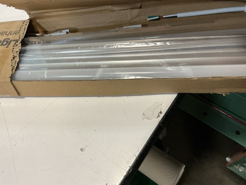 Condition photo showing As Is for 4ft led shop lights (2 pack), 2000lm 6500k super bright white t5 commercial lights, 20w linkable utility integrated single fixture for gym/garage/ceiling/under cabinet, plug & play 6500k super bright white pack of 2