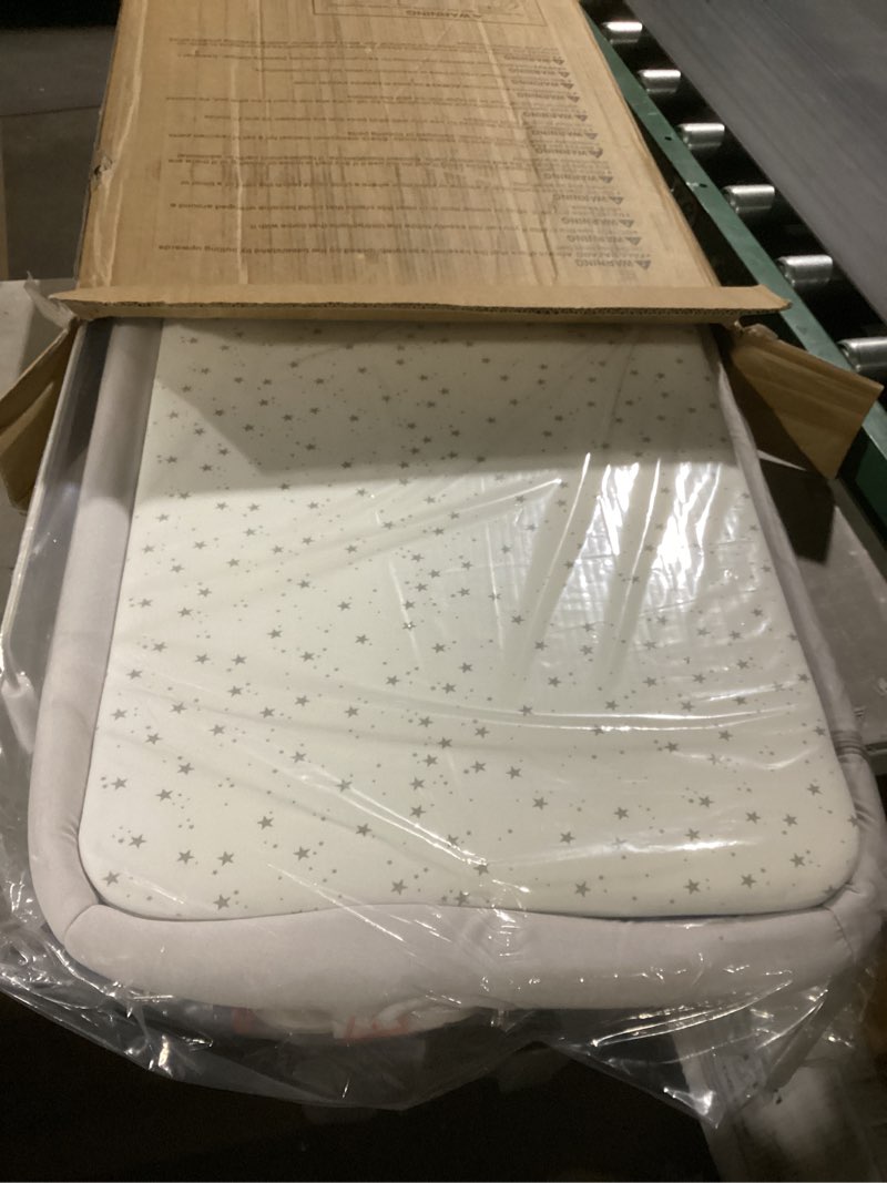 Condition photo showing New/Like New for angelbliss baby bassinet bedside sleeper, easy folding portable bassinet for baby with wheels, adjustable height, included mattress (beige)