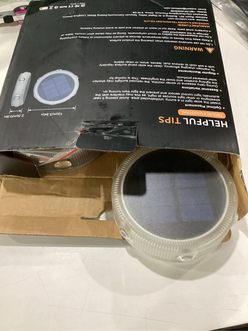Condition photo showing As Is for yilaie solar ground lights outdoor ip68 waterproof,4 pack solar garden lights outside,stick & stake landscape lighting for pathway lawn yard deck driveway walkway, warm white 4 warm white