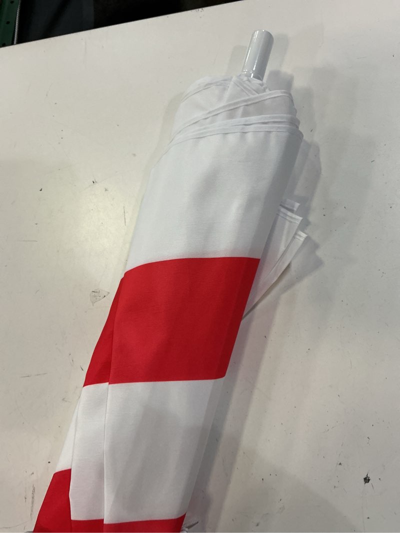 Condition photo showing New/Like New for 6.5ft usa american flag beach umbrella, tilted, portable, 100% uv protection, u.s. flag pattern with carrying case