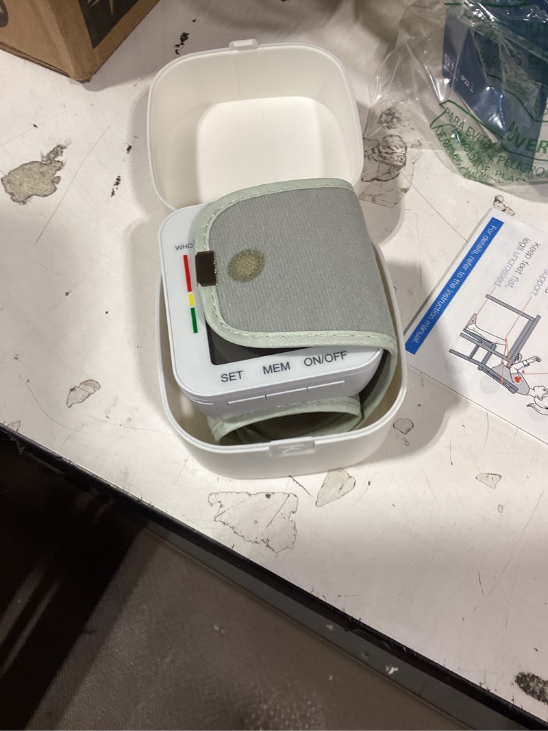 Condition photo showing Good Condition for mmizoo wrist blood pressure monitor large lcd display bp machine adjustable cuff 5.31-7.68 inch automatic 99x2 sets memory with carrying case for home use (w1681)