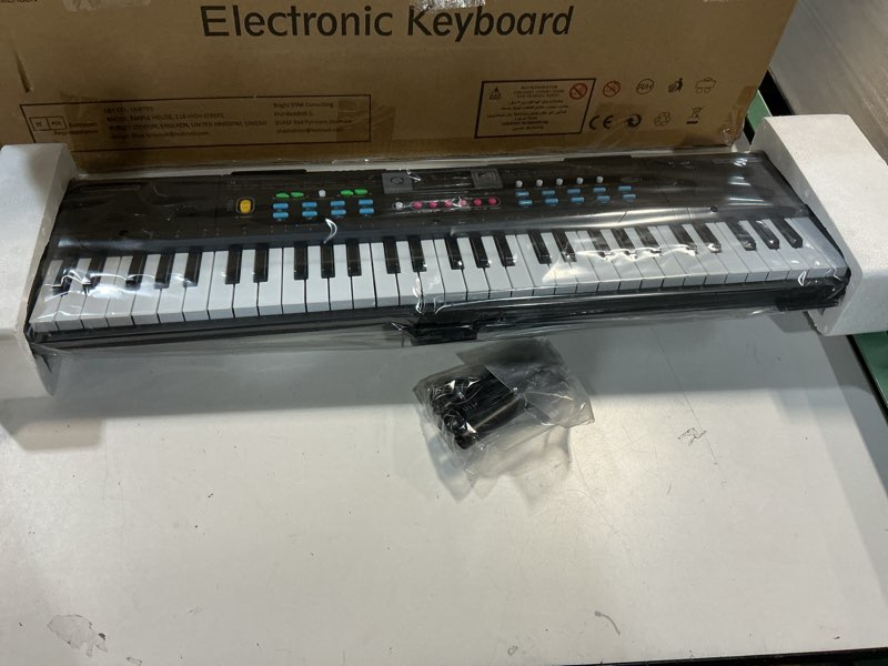 Condition photo showing New/Like New for TWFRIC Kids 61-Key Electronic Piano with Microphone, Black, Music Theme, Toy Keyboard Instruments, Piano, ABS Plastic, Alkaline Battery, Corded Electric, Musical Instrument Toy, Ages 5-9
