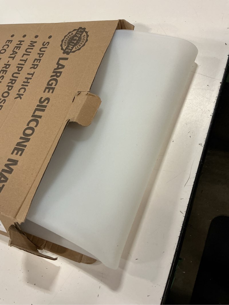 Condition photo showing Good Condition for 47.2"x23.6" large silicone mat for kitchen counter, heat resistant non-slip countertop protector, waterproof silicone craft mat for kitchen island, semitransparent translucent 47.3"l x 23.6"w