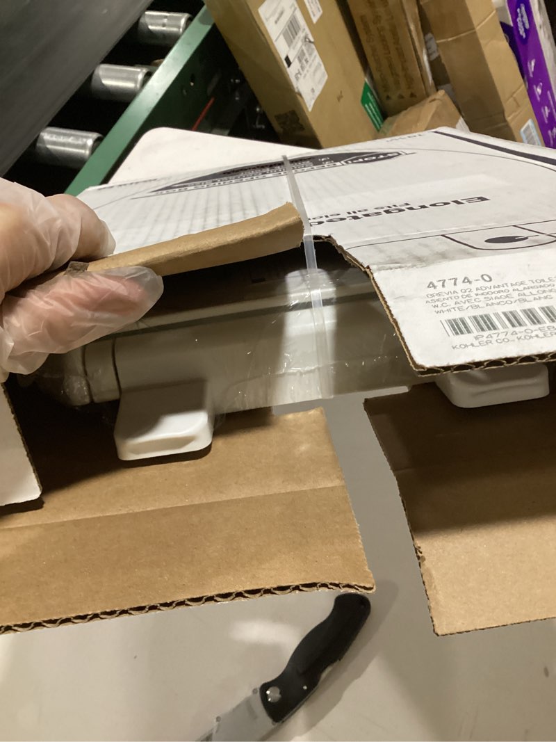 Condition photo showing New/Like New for kohler k-4774-0 brevia elongated white toilet seat with quick-release hinges and quick-attach hardware for easy clean, white