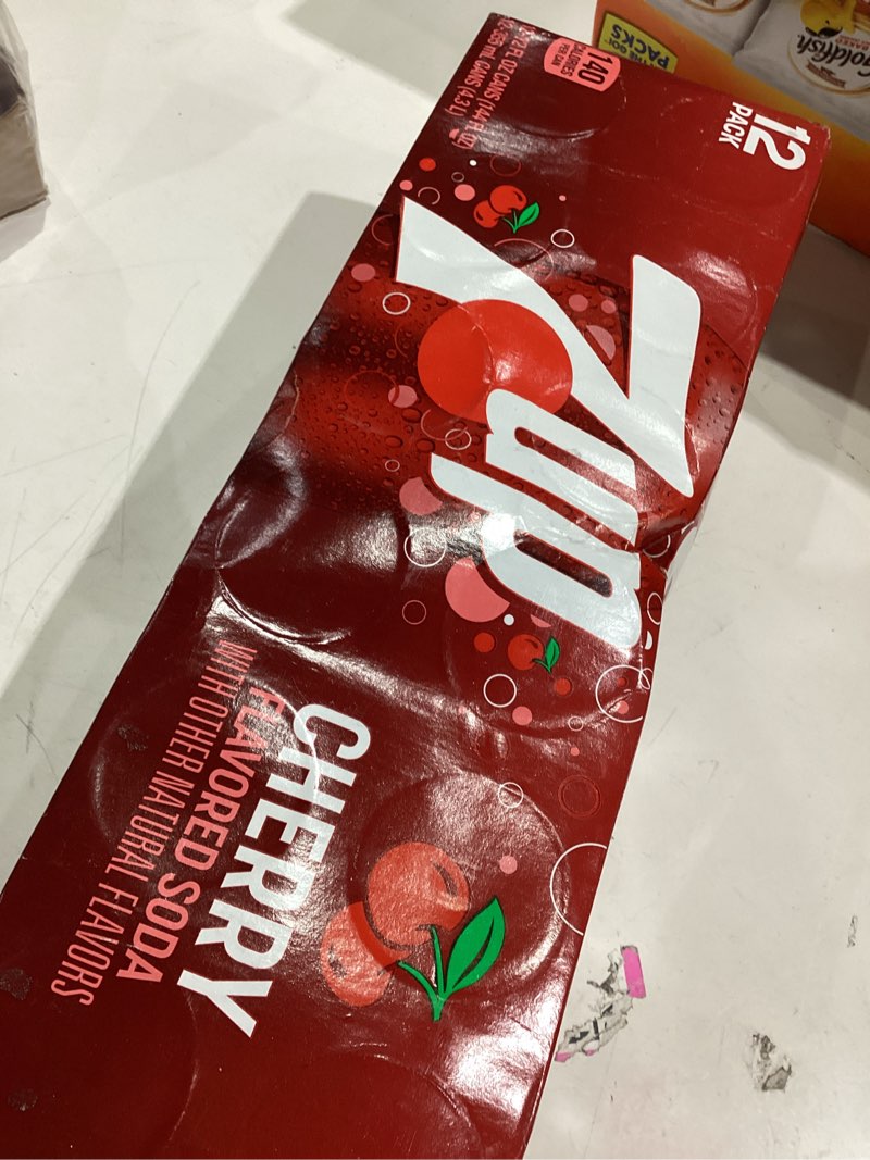 Condition photo showing As Is for 7UP Cherry Flavored Soda, 12 fl oz cans, 12 pack