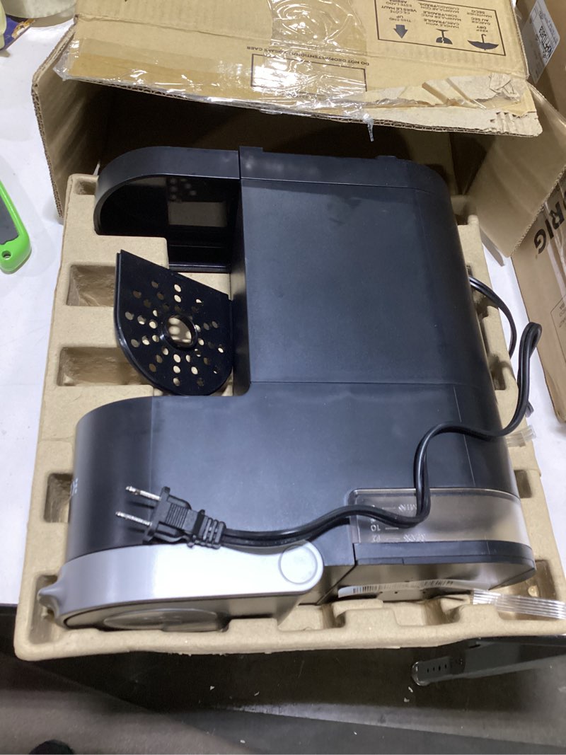 Condition photo showing As Is for Keurig K-Mini Single Serve K-Cup Pod Coffee Maker, 6 to 12oz Brew size, with Cord Storage, Perfect for Small Spaces, Black