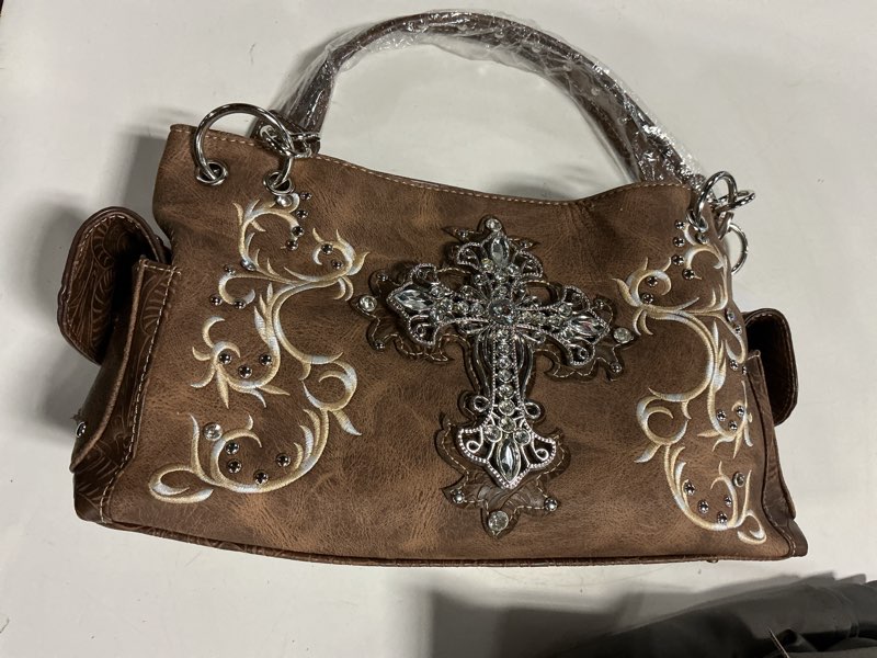 Condition photo showing Good Condition for (it has a small scratch but the bag is of quality )rhinestones & studs cross handbag concealed carry purse motorcycle religious bag