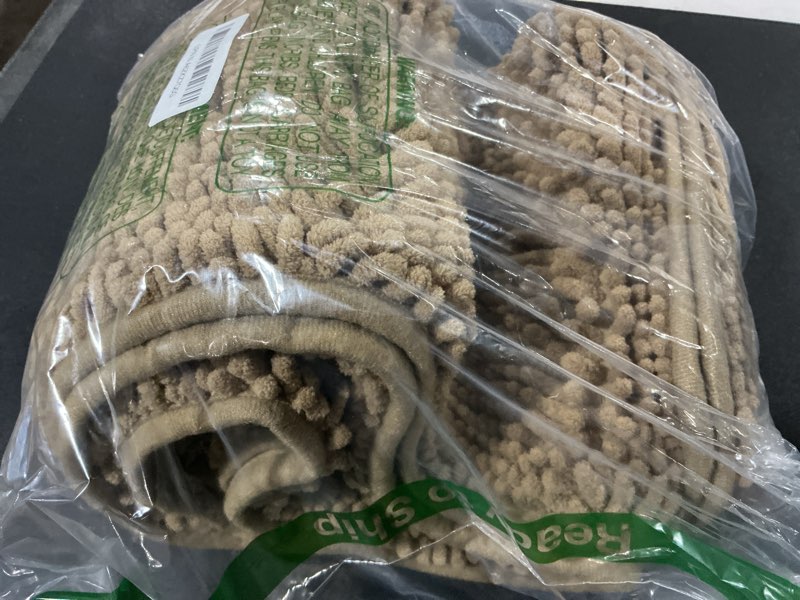 Condition photo showing As Is for OLANLY Bathroom Rugs 47x17, Extra Soft Absorbent Chenille Bath Rugs, Rubber Backing Quick Dry, Machine Washable Bath Mats for Bathroom Floor, Tub and Shower, Home Decor Accessories, Tan 47" x 17" Tan