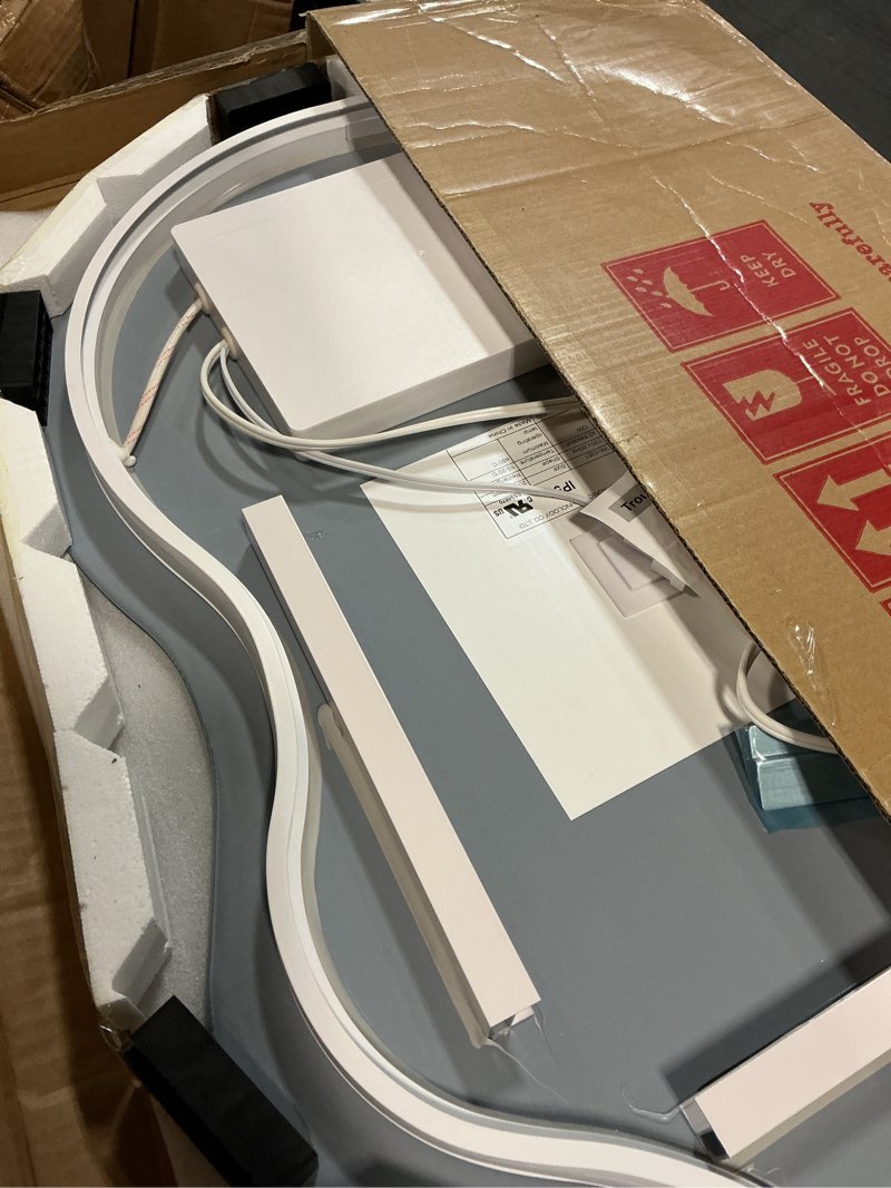 Condition photo showing Good Condition for okpal irregular backlit bathroom mirror with lights 20 x 36, asymmetrical cloud led lighted vanity mirror for wall, anit-fog, dimmable, memory function (horizontal/vertical) cloud-backlit 20"l x 36"w