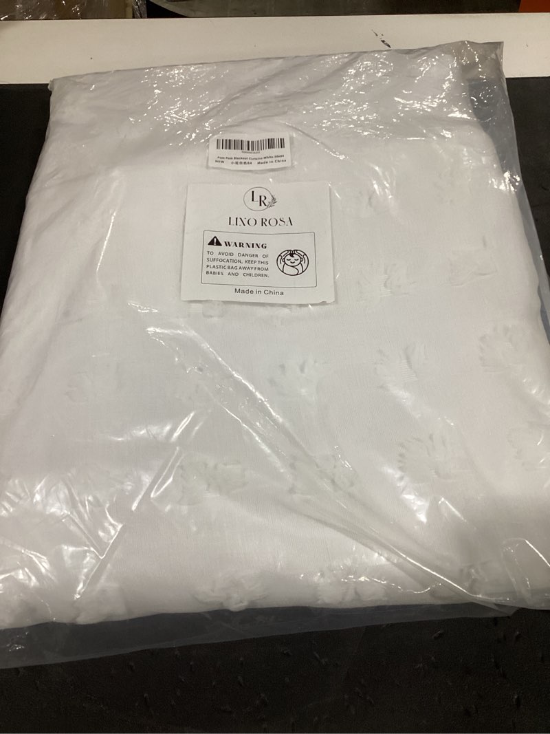 Condition photo showing New/Like New for white blackout pleated ruffle curtains for bedroom with design,room darkening pom pom textured ruffled farmhouse boho french country decorative curtains for living room 84 inches long 50"w x 84"l (pack of 2) white