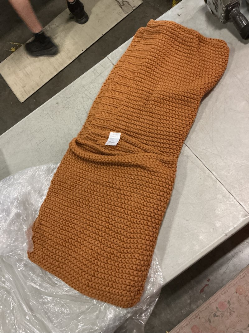 Condition photo showing New/Like New for cotton fisherman throw  burnt orange 50x60