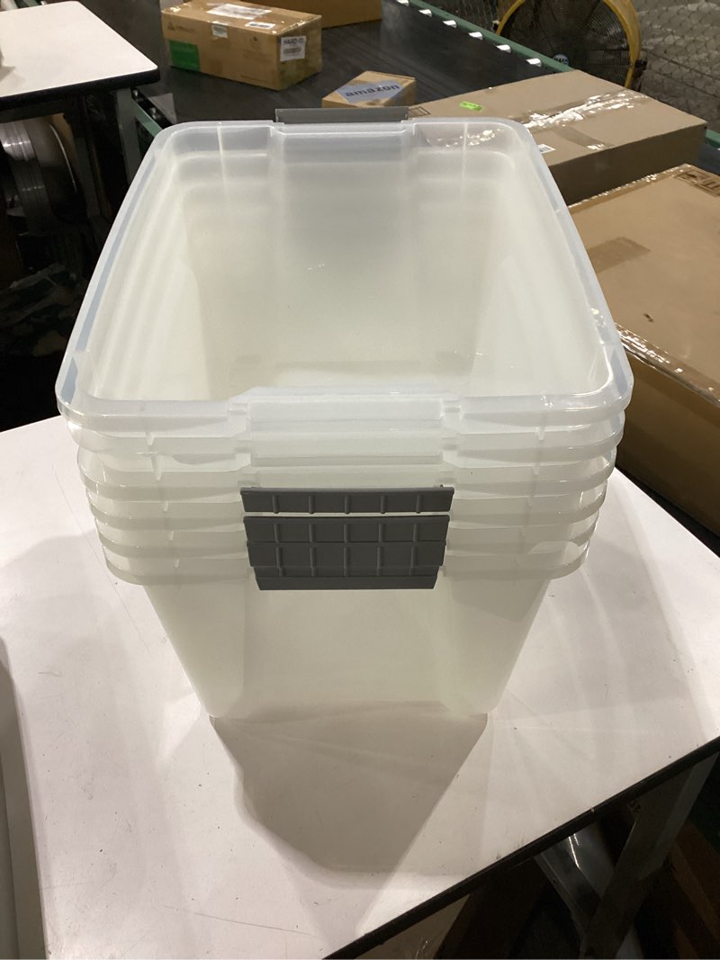 Condition photo showing As Is for amazon basics plastic storage containers with secure latching lids, stackable organization bins, clear/grey, 32 quart, set of 6 32 qt. - 6 pack