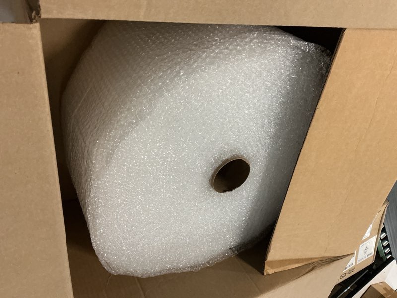 Condition photo showing New/Like New for amazon basics bubble wrap for moving, packing, shipping and storage, perforated protective cushioning for fragile items, 12-inch x 175-ft long roll, small 3/16", clear