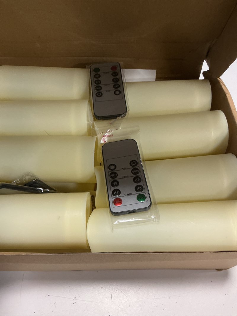 Condition photo showing Good Condition for enido 24 pc flameless led candles with remote & timer, outdoor waterproof, flickering electric warm lights for cozy home & holiday romantic decor, battery operated (d 2.2” x h 4”/5”/6” ivory