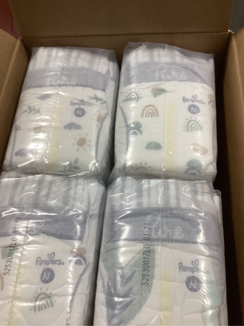 Pampers Pure Protection Baby Diapers, Size 0 (10 lbs ), 128 Count, Up to 100% Leakproof, Premium Pla