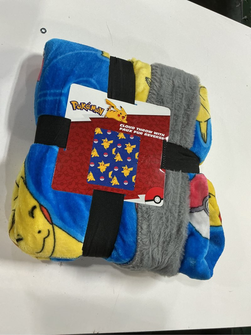 Condition photo showing New/Like New for licensed character plush faux fur kids throw blanket, 50" x 60"