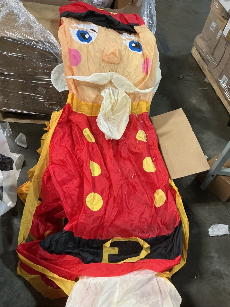 Condition photo showing As Is for HOMCOM 6’ Christmas Inflatable Nutcracker Toy Soldier, Outdoor Blow-Up Yard Decoration with LED Lights Display 6 feet (similar). 