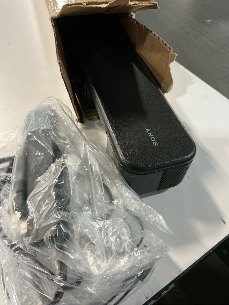 Condition photo showing As Is for Sony S100F 2.0ch Soundbar with Bass Reflex Speaker, Integrated Tweeter and Bluetooth, (HTS100F), easy setup, compact, home office use with clear sound black