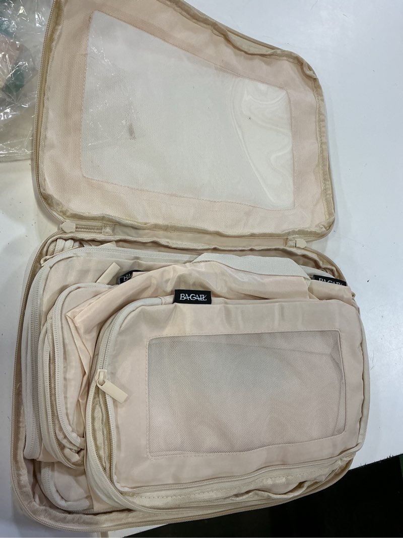 Condition photo showing Good Condition for bagail 4 set/6 set/8 set compression packing cubes travel accessories expandable packing organizers (square mesh, 05-cream) 05-cream square mesh