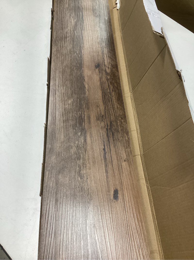 Condition photo showing Good Condition for peel and stick vinyl flooring 36 pack 54 sq.ft, waterproof vinyl flooring peel and stick for office, living room, bathroom, kitchen - unique design, easy to install floor black 36 x 6 x 0.1 inches black 36