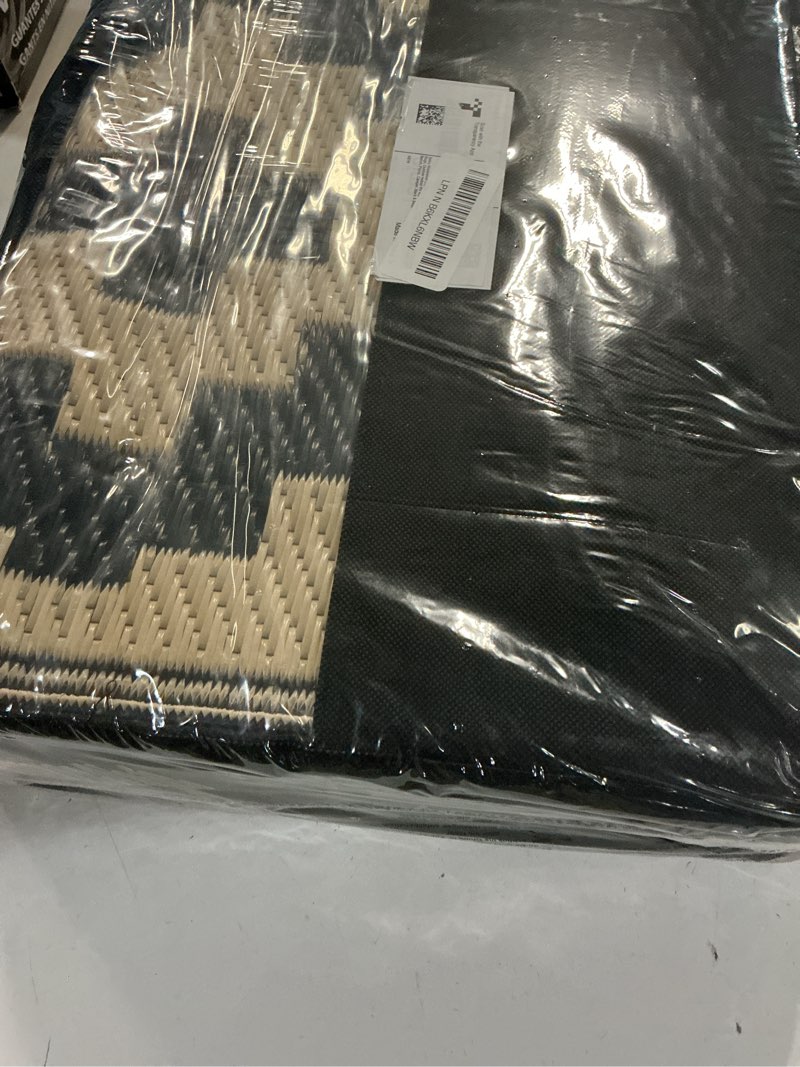 Condition photo showing New/Like New for smiry waterproof outdoor rug 5x8 ft, reversible plastic straw patio camping rugs, outdoor indoor rv mat carpet for patio, outside entry, backyard, deck, bench, picnic, camper, black & beige black and beige 5' x 8' (rectangular)