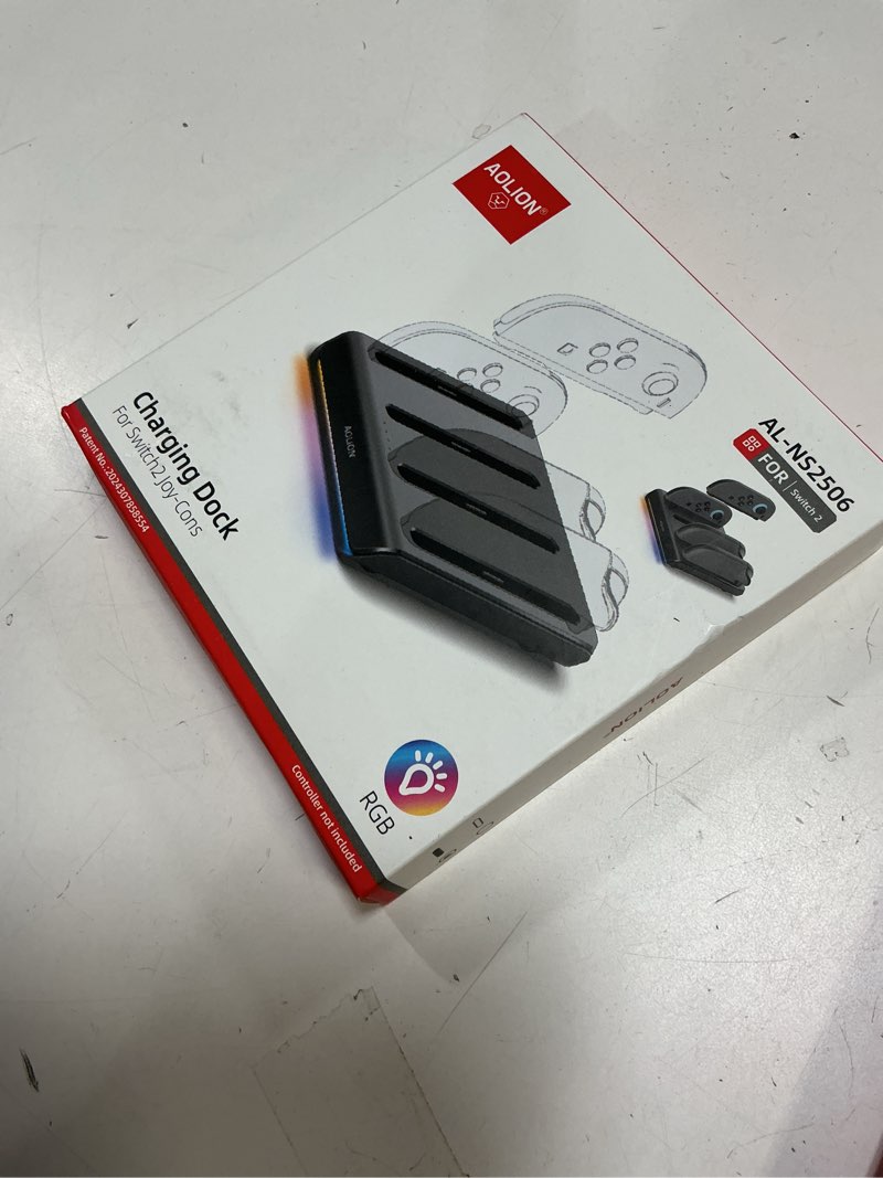 Condition photo showing New/Like New for Charger Dock for Nintend0 Switch 2 Joycon, 4-in-1 Switch 2 joycon Charging Dock with 8 RGB Lighting Modes, LED Indicators, 5V/2A Fast Magnetic Charging, Circuit Protection, and USB-C Cable (Black)