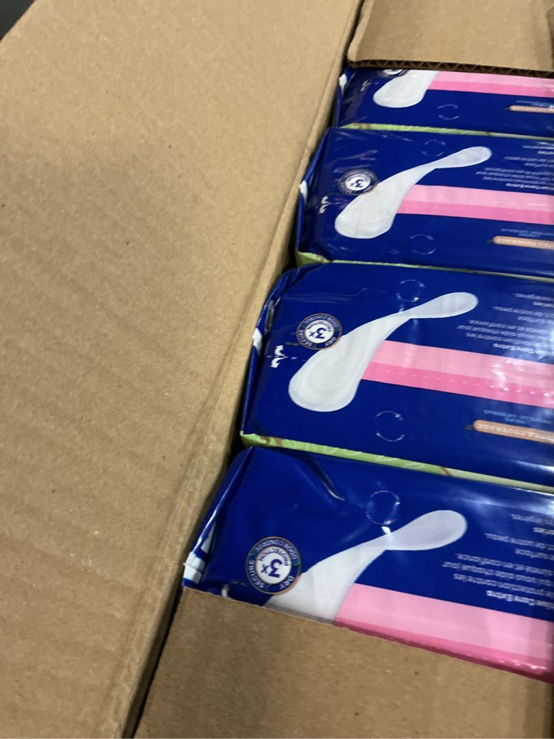 Condition photo showing New/Like New for tena sensitive care panty liners for women, very light absorbency, extra coverage, sensitive care - 300 count 300 count (pack of 1)