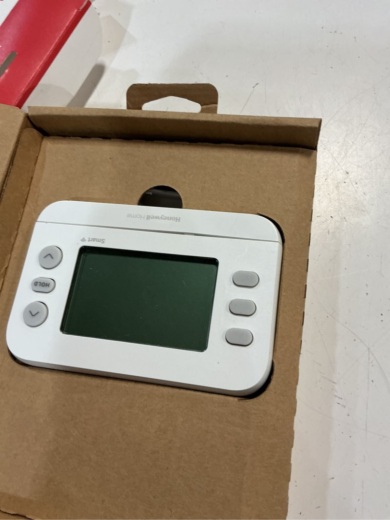 Condition photo showing As Is for honeywell home x2s smart built in wifi heating and cooling push button smart-enabled programmable th