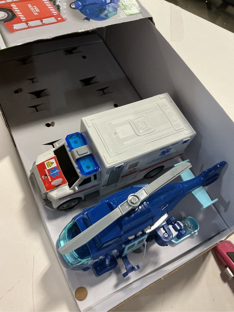 Condition photo showing Good Condition for joyin 4 packs emergency vehicle toy playsets, friction powered vehicles with light and sound, including fire truck, ambulance, play police car and helicopter, toddler kids boys gifts