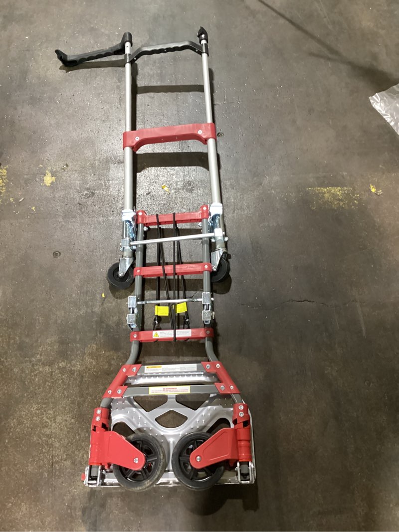 Condition photo showing As Is for (possibly used)milwaukee 150-lb capacity 4 -wheel multiple colors/finishes aluminum convertible hand truck